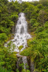 Obraz premium Cuigu waterfall in Xiaoqikong scenic spot, Libo County, Guizhou Province, China