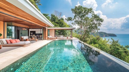 Modern Luxury Villa with Scenic Ocean View and Infinity Pool Surrounded by Lush Greenery Offering Tranquil Relaxation and Serene Outdoor Living Spaces