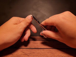 Hands holding manicure accessories. Nail care