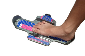A foot being measured for shoes, isolated on white background with clipping path. Foot measurement...
