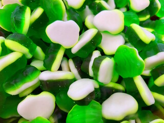 Lots of sweet gummy candies close up. Festive treats