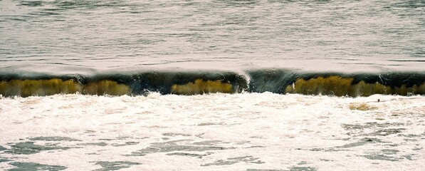 Waterfall on the river. Kuldiga, Latvia. Panoramic photo.