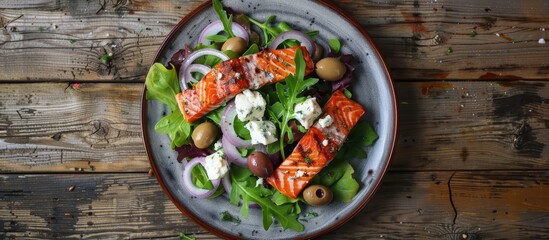 Salad With Salmon Feta Cheese Onions And Olives On A Wooden Surface