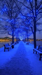 Blue fairy lights wrapped around trees on the Thames, London. 