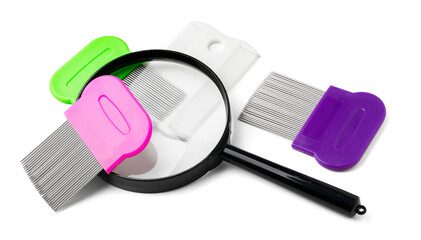A magnifying glass and lice comb placed side by side on a clean white background