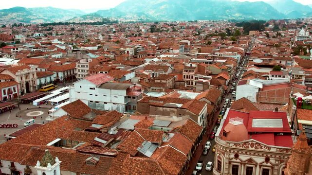 An aerial drone shot captures the grandeur of the Cathedral of the Immaculate Conception in Cuenca, Ecuador, The cathedral&rsquo;s iconic blue domes stand out, framed by the charming colonial architecture
