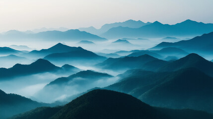 Fototapeta premium Misty mountain range landscape. Concept of serenity, tranquility, and nature.