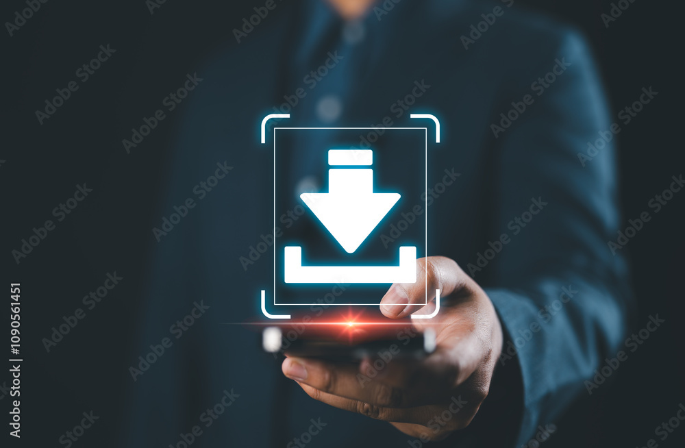 Poster download technology for data storage and transfer. a man holds a smartphone with glowing download ic