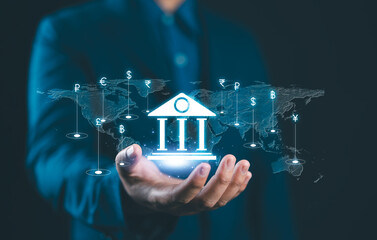 Global currency exchange concept. Businessman holding virtual banking with dollar yuan yen euro...