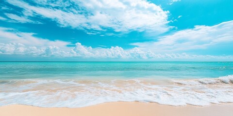 Obraz premium Stunning tropical paradise beach background that evokes summer vibes. This summer vacation time image features calm ocean waves, tranquil scenes, and emerald green sea water under a blue sky with