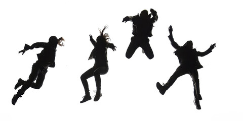Fototapeta premium Dynamic silhouettes of people in mid-air jump. High energy action shot, black and white, abstract style