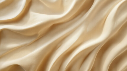 Obraz premium Beautiful background of beige silk fabric with waves and folds, elegant texture for design, high resolution