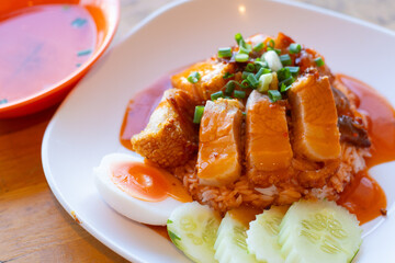 crispy pork belly on topped rice - Aisan food style