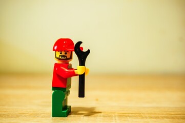 Obraz premium Lego man with wrench.