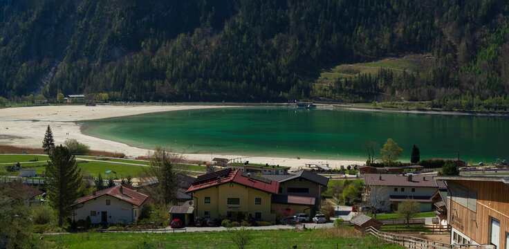 During a spring hiking exercise it is always worth to spot though the green forest nature towards to the Achensee lake and the beautiful turquoise colored water