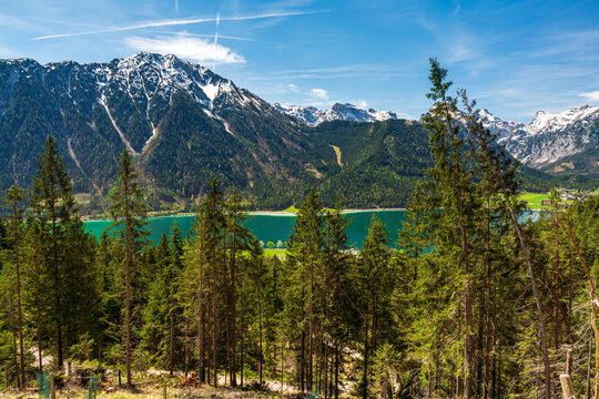 During a spring hiking exercise it is always worth to spot though the green forest nature towards to the Achensee lake and the beautiful turquoise colored water