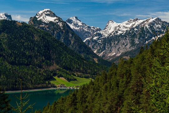 During a spring hiking exercise it is always worth to spot though the green forest nature towards to the Achensee lake and the beautiful turquoise colored water