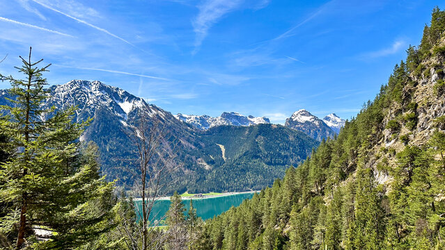 During a spring hiking exercise it is always worth to spot though the green forest nature towards to the Achensee lake and the beautiful turquoise colored water