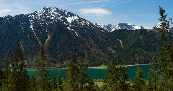 During a spring hiking exercise it is always worth to spot though the green forest nature towards to the Achensee lake and the beautiful turquoise colored water