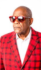 Obraz premium Confident Man in Stylish Red Plaid Jacket and Sunglasses
