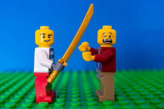 Lego man with long sword