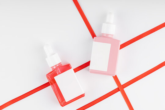 Elegant cosmetic packaging with vibrant ribbons