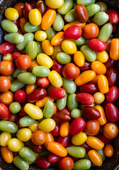 Multi coloured fresh baby and cherry tomatoes 