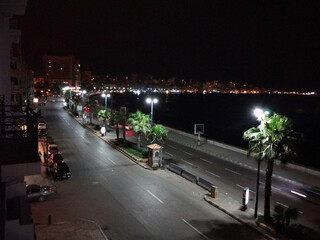 Fototapeta premium Alexandria - night city view with Mediterranean sea, Egypt