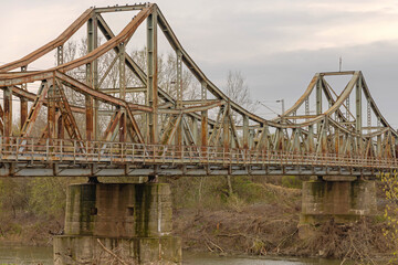 Fototapeta premium Old Rusty Iron Ljubichevo Bridge Over Great Morava River Spring Day in Pozarevac Serbia