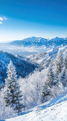 Obraz premium Breathtaking winter landscape of the Wasatch Mountains showcasing snow-covered peaks under a clear blue sky