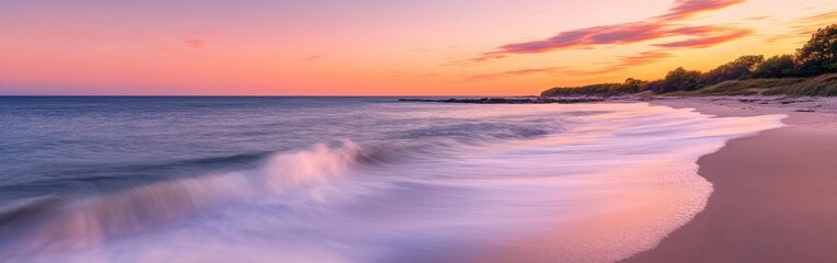 Obraz premium A tranquil sunset at the Connecticut coastline with gentle waves lapping against the shore