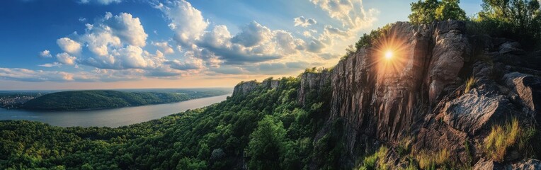 Breathtaking panoramic view of the Palisades Cliffs at sunset, showcasing the blend of rock formations and lush greenery along the Hudson River