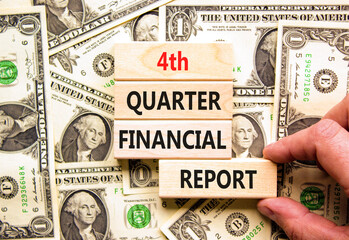 4th quarter financial report symbol. Concept words 4th quarter financial report on beautiful wooden...