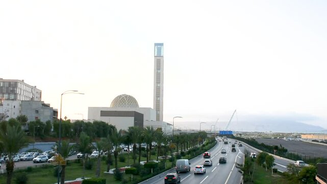 High-angle view of a traffic jam on a highway beside the great mosque of Algiers, Algeria.