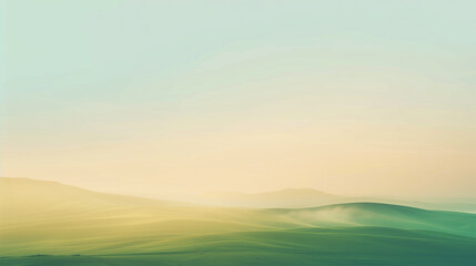 Obraz premium A dreamy, minimalist background showcasing a softly blurred horizon of rolling green hills under a golden sunrise, with a light mist rising from the ground. The sky transitions from soft peach to pale