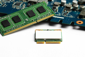 Wi-Fi card, RAM chip and computer circuit board isolated on white. Electronic engineering