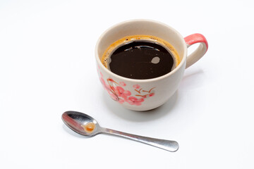 A glass of hot black coffee for your morning drink.