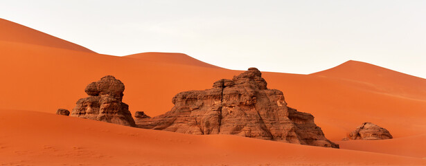 Sand dunes and rocks in the Sahara Desert, Algerian part in the Tadrart and Tassili n'Ajjer...