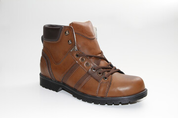 Men's boots. Waterproof leather. white background. Side view.