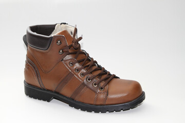 Men's boots. Waterproof leather. white background. Side view.