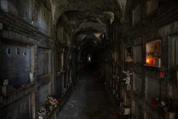 Fototapeta premium Rome, Italy - May 29, 2024: Dark Crypt Columbaria at Verano Monumental Cemetery in Rome.