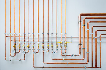 Copper Pipe Network: Industrial Plumbing System, Detailed Close-up of intricate copper pipes and fittings, showcasing valves and pressure gauges. Clean, efficient and modern industrial system