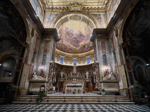 The altar of the Basilica della Santissima Annunziata baroque and renaissance styled church in Florence, Italy
