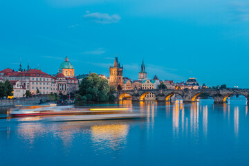Karlův most - Charles Bridge (Arch bridge) in Prague, at dusk - sunset