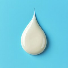 Fototapeta premium Droplet of cream on a light blue background demonstrating texture and color contrast