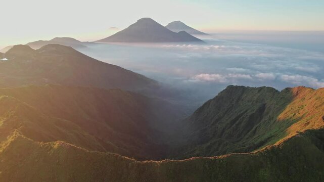Aerial view of Mount Bismo in the morning, showcasing a stunning landscape with clear skies and a serene atmosphere, capturing the beauty of nature. High-quality 4K footage.