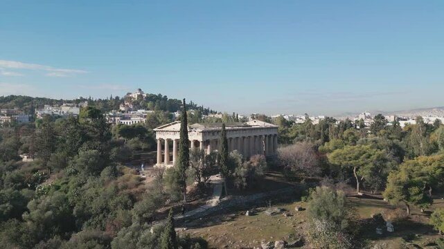 Ancient temple of Hephaestus in historical centre of Athens, Agora aerial panoramic footage