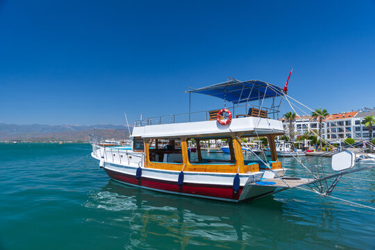 Pleasure motor boat is moored at Fethiye marina, Turkey
