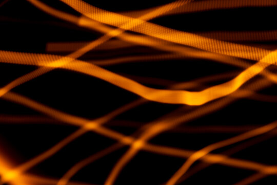 Yellow and orange lights making lines. Resource for superimposition