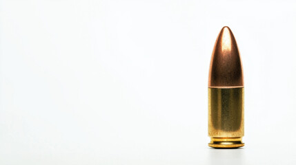 A single bullet cartridge stands upright against a plain white background, highlighting its metallic texture and intricate details.